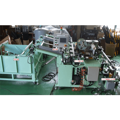 自動テープ貼り機-株式会社栗巣鉄工